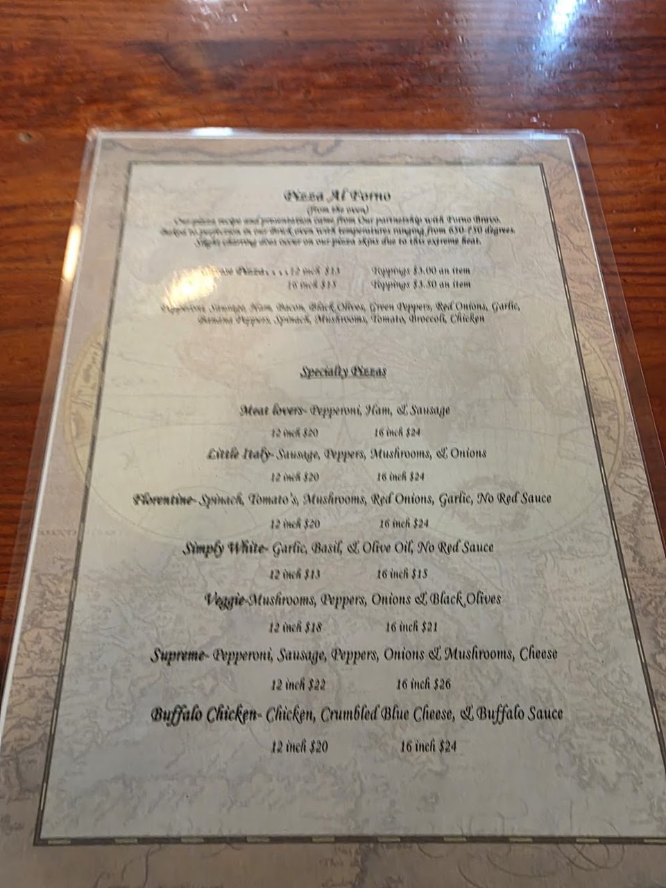 Close-up of appetizer, salad, and burger sections.